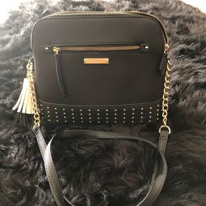Black with gold studs Steve Madden crossbody bag.